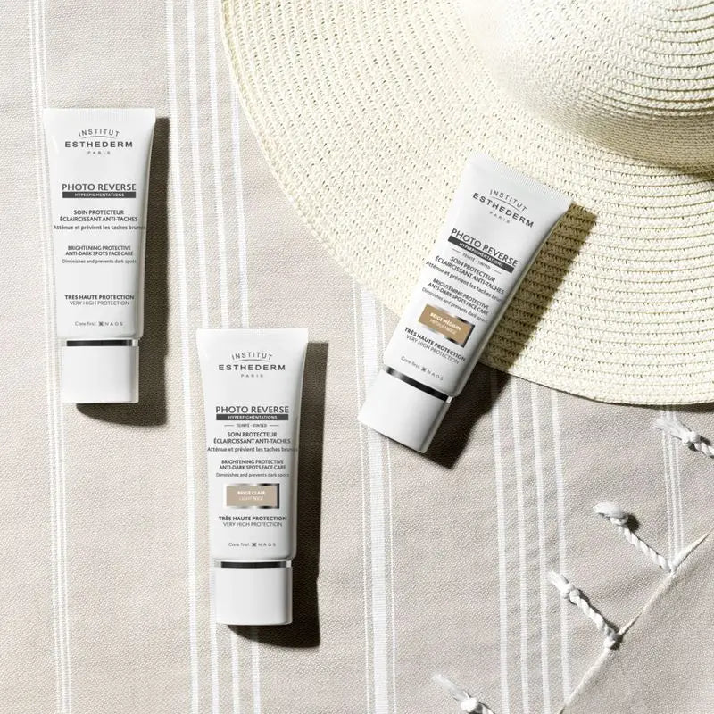 Institut Esthederm Photo Reverse -aurinkovoide, joka ehkäisee pigmenttimuutoksia, kultainen sävy, 50 ml